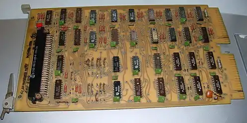 1970s I1 parallel interface board for Electronika 60.  The green rectangular parts are decoupling capacitors.