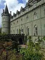 Close view of the façade and green cladding of it