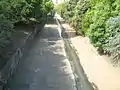 Looking downstream from the Church Street bridge during dry weather.