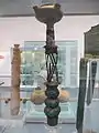 Bronze four-nozzled lamp-stand