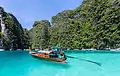 Long-tail boat on the shore of Phi Phi Island