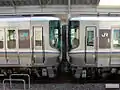 A 223-5000 series (left) coupled with a JR Shikoku 5000 series (right)