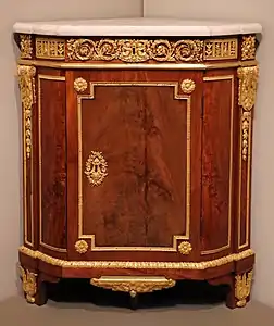 Parisian corner cabinet; by Jean Henri Riesener; 1780–1790; oak, mahogany, marble, and ormolu mounts; 94.3 × 81.3 × 55.9&nbsp;cm; Art Institute of Chicago (US)