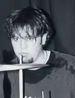 A photo of drummer J. Elliott