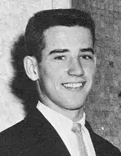 Photo of a young Joe Biden smiling at the camera