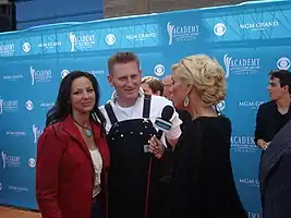 Joey (left) and Rory Lee Feek (center) being interviewed by Allison DeMarcus.