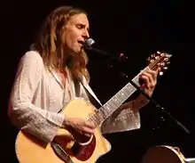 Davison performing in 2013