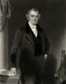 mezzotint engraving, three-quarter length, John standing by a table with papers next to a chair