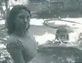 Judaage Aminat Didi in 1982, wearing the simple customary libaas worn by all southern Maldivian women before the modern islamization promoted by President Maumoon. Fua Mulaku women initially resisted and the first "burugaa" head covering reached Fua Mulaku only in 1989.
