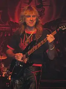 Judas Priest Retribution 2005 Tour Glenn Tipton (cropped).jpg