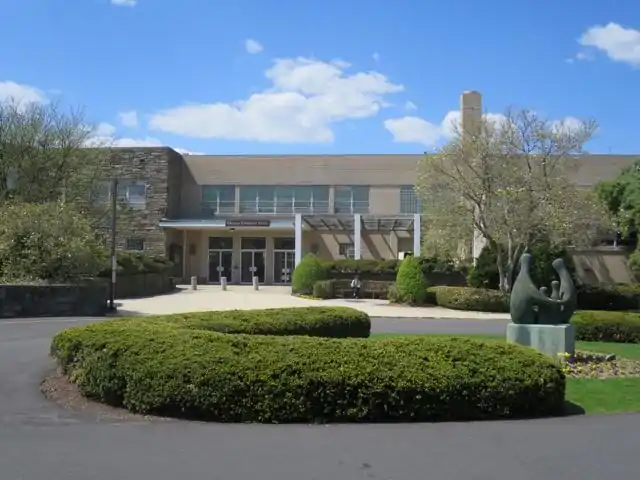 KI circle drive on the parking lot side of the foyer includes extensive outdoor artwork