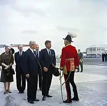 Civil Governor and military Commander-in-Chief of Bermuda, Major-General Sir Julian Gascoigne (right), with Minister for Foreign Affairs and Earl of Home Alec Douglas-Home, Prime Minister Harold Macmillan, British Ambassador to the United States Sir David Ormsby-Gore, and United States President John F. Kennedy in 1962