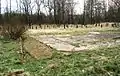 Foundations of the Husum-Schwesing sub-camp (with steles in the background)