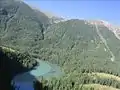 Kanas lake besides the alpine glacier