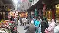 The gate leads to the Kashmiri Bazaar