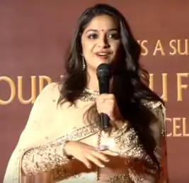 A picture of Keerthy Suresh during success meet of the film Mahanati.