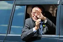Khem Sokha greets his supporters as he leaves the Phnom Penh Municipal Court on 19 January 2022
