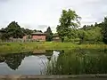 Killingbeck Pond, in Killingbeck Fields, with Acorn Business Park behind