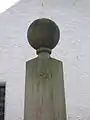 The '1830' date on the Mercat cross.