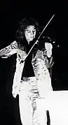Cross performing with King Crimson in 1974.