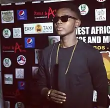A portrait of Kizz Daniel