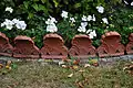 Palmette style border stones