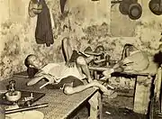 An opium den in the Chinatown, Kolkata, 1945