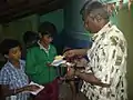 Kosambri distribution during a festival in a south Indian village.