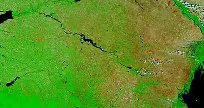 Kuma-Manych Depression and Manych River from low earth orbit.Upper left is the eastern tip of the Sea of Azov and lower right is the Caspian Sea. In the middle of the image is the Lake Manych-Gudilo.Upper right is the Volga and lower left is the Kuban River.