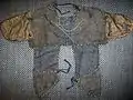 Antique Japanese (samurai) manju-no-wa, made from chain armour kusari sewn to a cloth backing.
