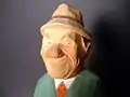 Wood carving head detail of a golfer by Lars Trygg circa 1961