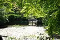Lake and bridge outside the Kuri, the main hall (summer)