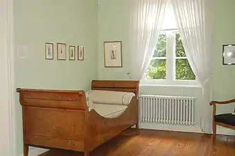 Sleigh bed (c. 1820/1830) in the Helgoland room, Museum Langes Tannen, Uetersen, Germany.
