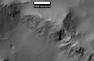 Layers along crater rim in Terra Sirenum, as seen by HiRIS under the HiWish program