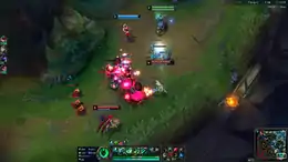 Screenshot of League of Legends, featuring four champions in the bottom lane of the game's primary map, surrounded by minions.