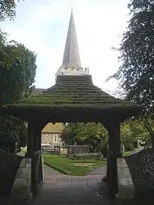 Early 20th-century lychgate at St Andrew's Church, West Tarring, West Sussex