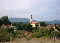 The catholic church of Mátraderecske and the Kékes