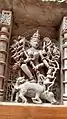 Durga killing Mahishasura