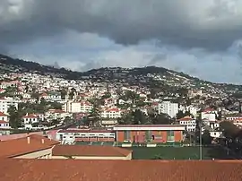 The urbanized coastal buildings of Santa Maria Maior situated in a mountainous geography