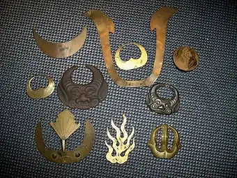 Various Japanese maedate, crests that are mounted in the front of a samurai helmet kabuto.