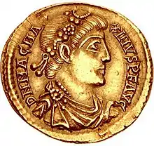 Golden coin depicting man with diadem facing right