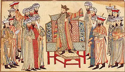 Sultan Mahmud of Ghazni&nbsp;receiving a richly decorated robe of honor from the caliph&nbsp;al-Qadir&nbsp;in 1000. Miniature from the Rashid al-Din's&nbsp;Jami‘ al-Tawarikh