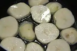 Using potatoes as tadig in chelow-style rice-cooking