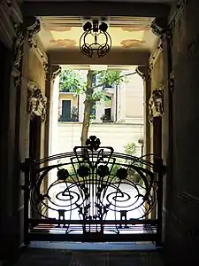 Casa Guazzoni, driveway with Mazzucotelli's fence