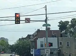 Facing south at the intersection of Mantua Avenue and 34th Street, located at the northern border of Mantua. Directly behind the viewer is a bridge which leads to the Philadelphia Zoo.