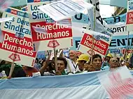 Image 40Union members march in Argentina on Human Rights Day in December 2005.  The signs read "Worker rights are human rights..