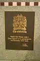 Plaque marking a time capsule to be opened in 2035.