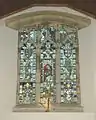 15th-century Perpendicular Gothic east window of St Peter's church