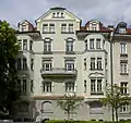 richly structured and stuccoed Art Nouveau building built by Anton Hatzl in 1906-07 with two oriels and gables at Martiusstraße 1