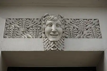 Art Deco mascaron above the door of Rue Mademoiselle no. 40, Paris, unknown architect, c.1930